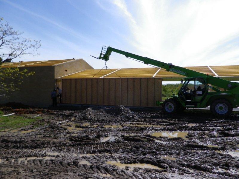 Murs ossature bois autour d'une structure bois (49)
